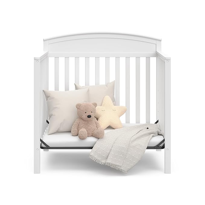 Graco Benton 4-in-1 Convertible Mini Crib with Bonus Crib Mattress (White) – GREENGUARD Gold Certified, 2.75-Inch Mattress Included, Baby Crib Converts to Twin Bed, Ideal for Small Spaces