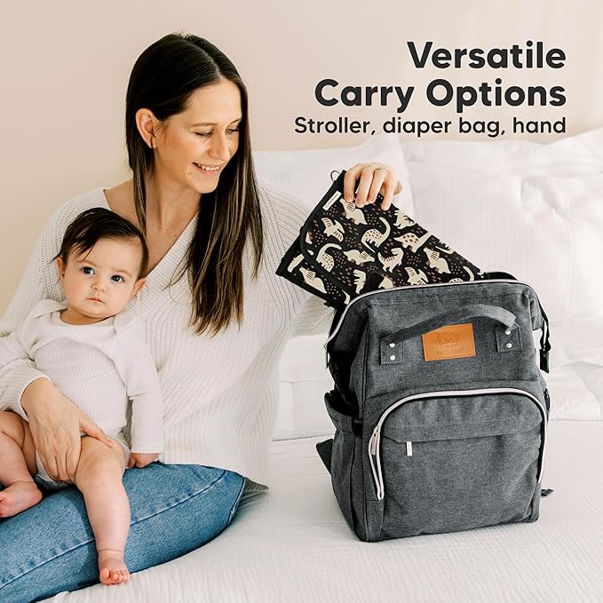 KeaBabies Portable Diaper Changing Pad - Large Waterproof Baby Changing Mat, Compact Travel Diaper Clutch, Functional Pockets Fit Newborn Essentials, Wipeable & Padded Baby Changer (Dino Ridge)