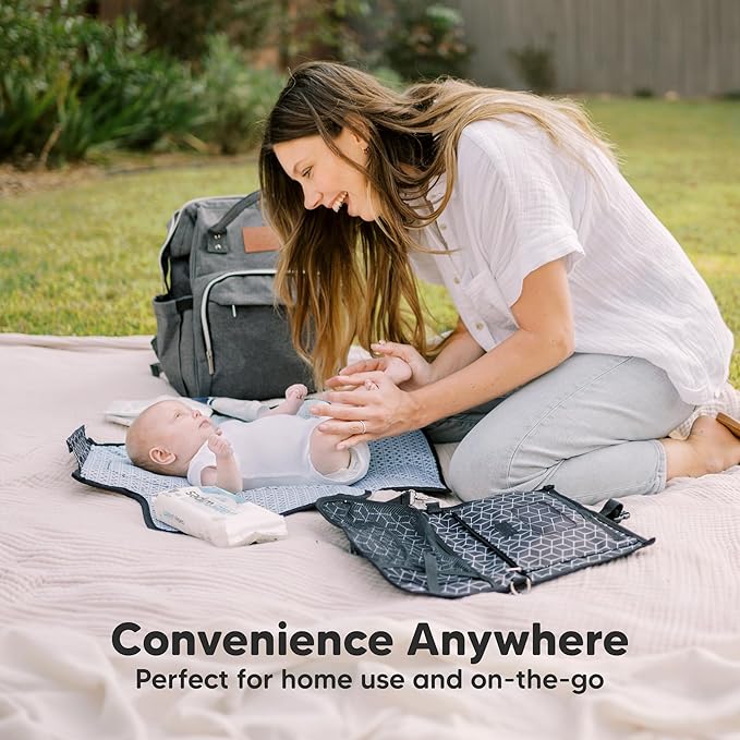 KeaBabies Portable Diaper Changing Pad - Large Waterproof Baby Changing Mat, Compact Travel Diaper Clutch, Functional Pockets Fit Newborn Essentials, Wipeable & Padded Baby Changer (Pets & Paws)