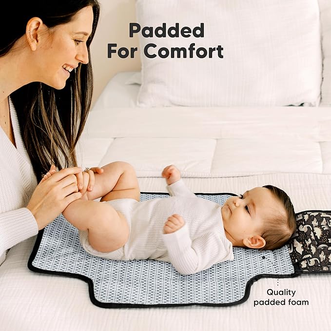KeaBabies Portable Diaper Changing Pad - Large Waterproof Baby Changing Mat, Compact Travel Diaper Clutch, Functional Pockets Fit Newborn Essentials, Wipeable & Padded Baby Changer (Dino Ridge)