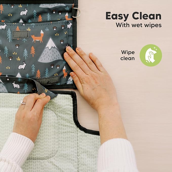 KeaBabies Portable Diaper Changing Pad - Large Waterproof Baby Changing Mat, Compact Travel Diaper Clutch, Functional Pockets Fit Newborn Essentials, Wipeable & Padded Baby Changer (Woods)