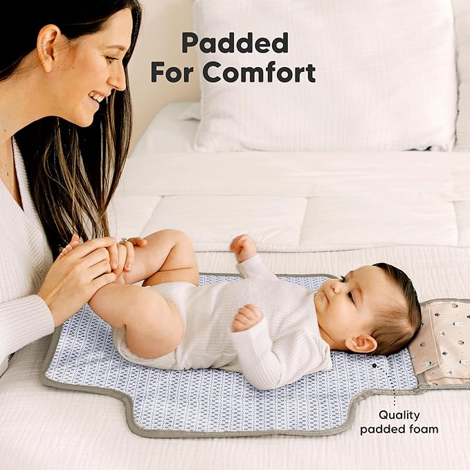 KeaBabies Portable Diaper Changing Pad - Large Waterproof Baby Changing Mat, Compact Travel Diaper Clutch, Functional Pockets Fit Newborn Essentials, Wipeable & Padded Baby Changer (Wild Patrol)