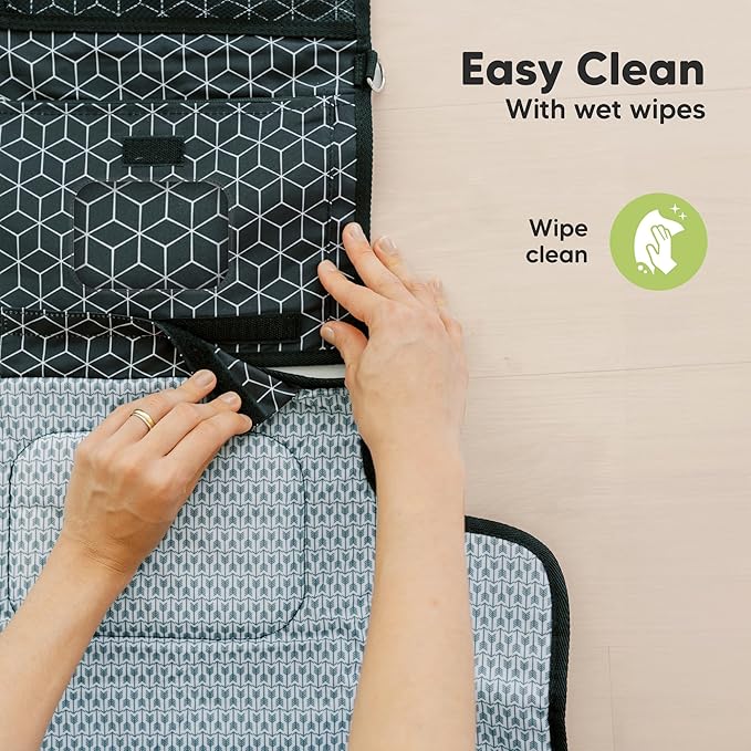 KeaBabies Portable Diaper Changing Pad - Large Waterproof Baby Changing Mat, Compact Travel Diaper Clutch, Functional Pockets Fit Newborn Essentials, Wipeable & Padded Baby Changer (Dino Ridge)