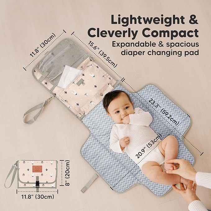 KeaBabies Portable Diaper Changing Pad - Large Waterproof Baby Changing Mat, Compact Travel Diaper Clutch, Functional Pockets Fit Newborn Essentials, Wipeable & Padded Baby Changer (Wild Patrol)
